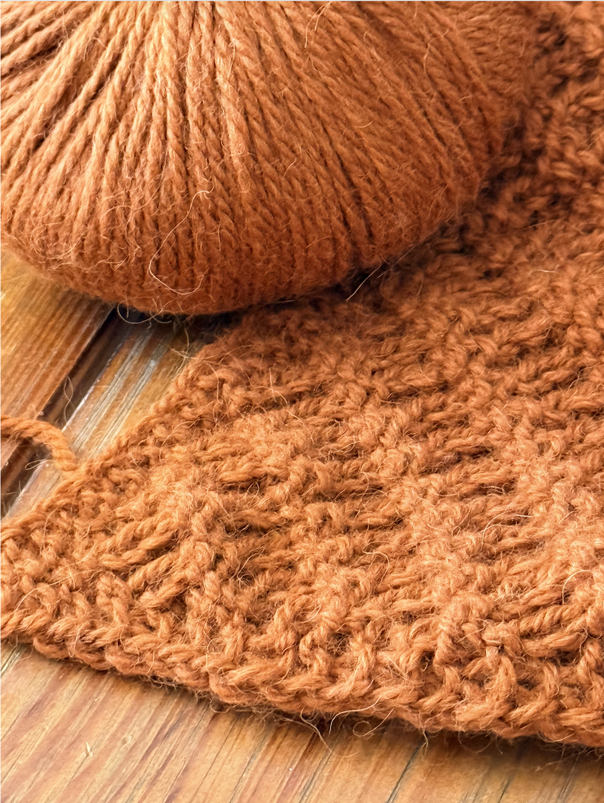Ember Ridge shawl draped with yarn